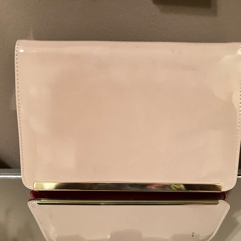 Elegant Cream Clutch with Gold Accent